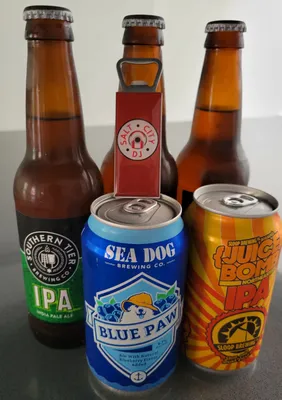 Custom designed bottle openers Thanks Tablecoversnow